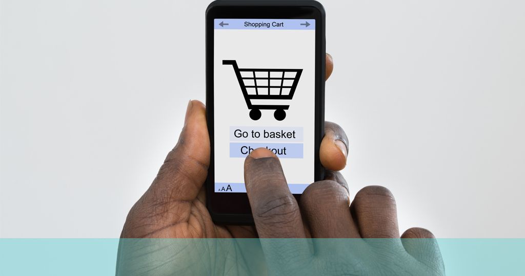 image pf mobile device and ecommerce basket