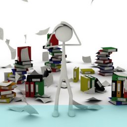 picture of a person with their hands on their head surrounded by files and documents